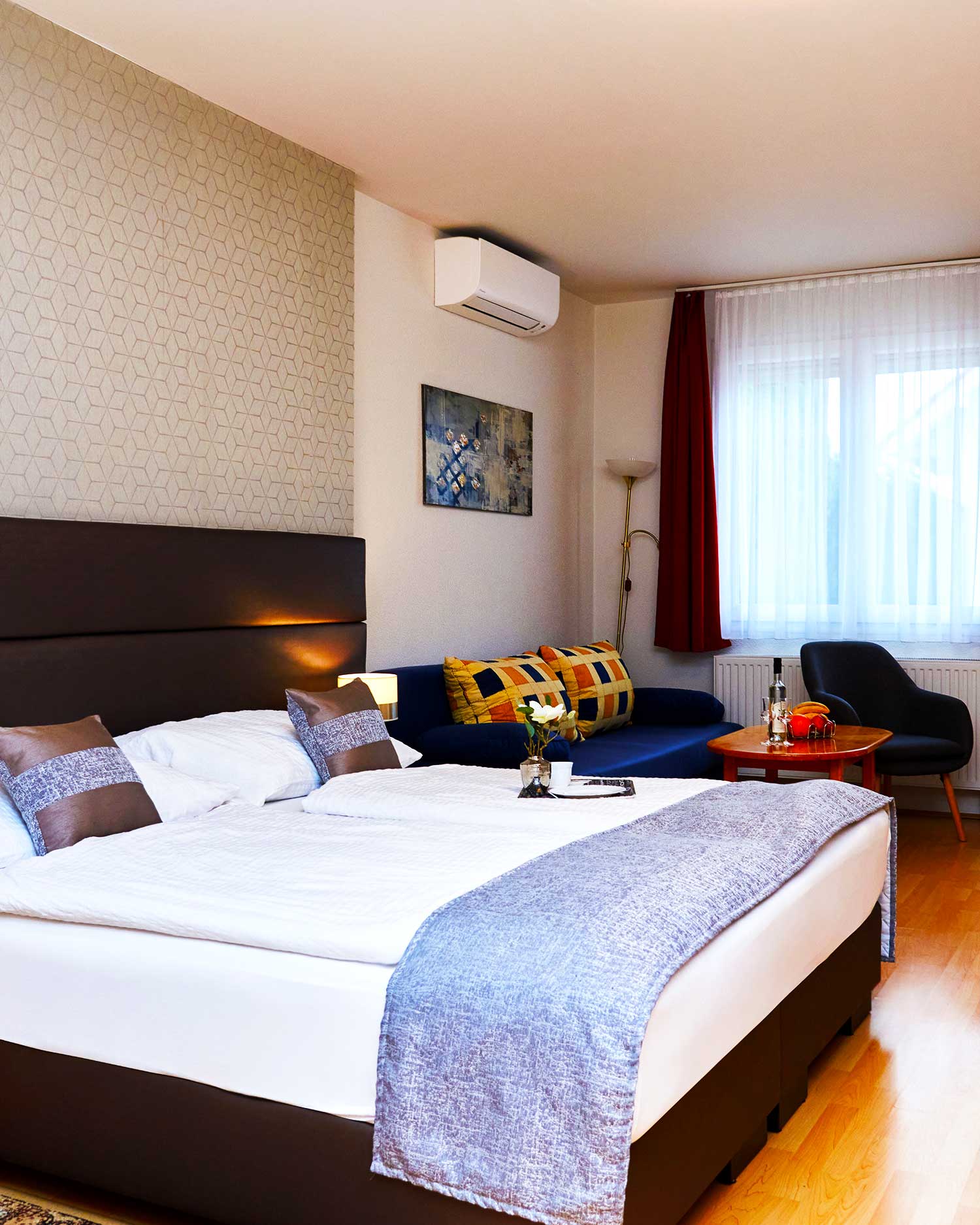 Tágas családi apartman nappalival